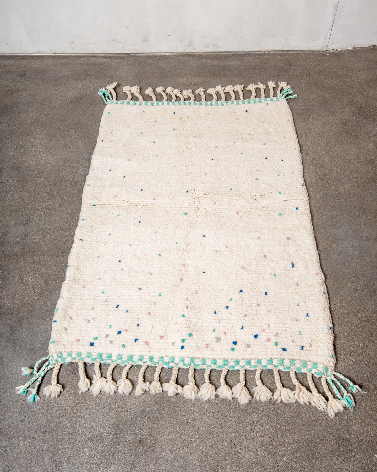 Modern, designer, handcrafted Berber rug from Morocco. Beniourain carpet with beautiful colours and patterns and fluffy wool texture.